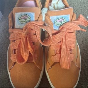 Orange and Brown Golf Le Fleur Converse